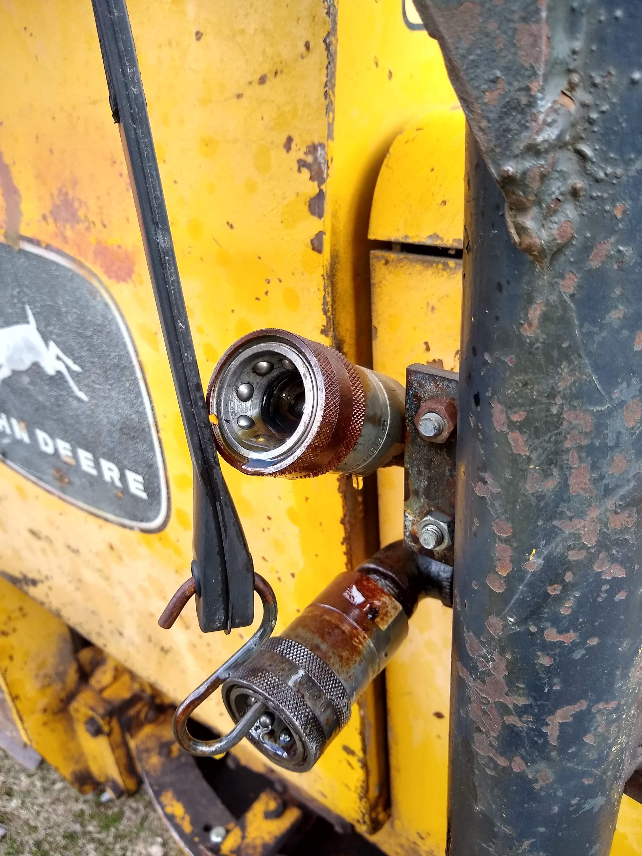 Watch the video. John Deere JD 350-B wide track dozer with 9 foot 6-way blade. Tracks are 32" wide.