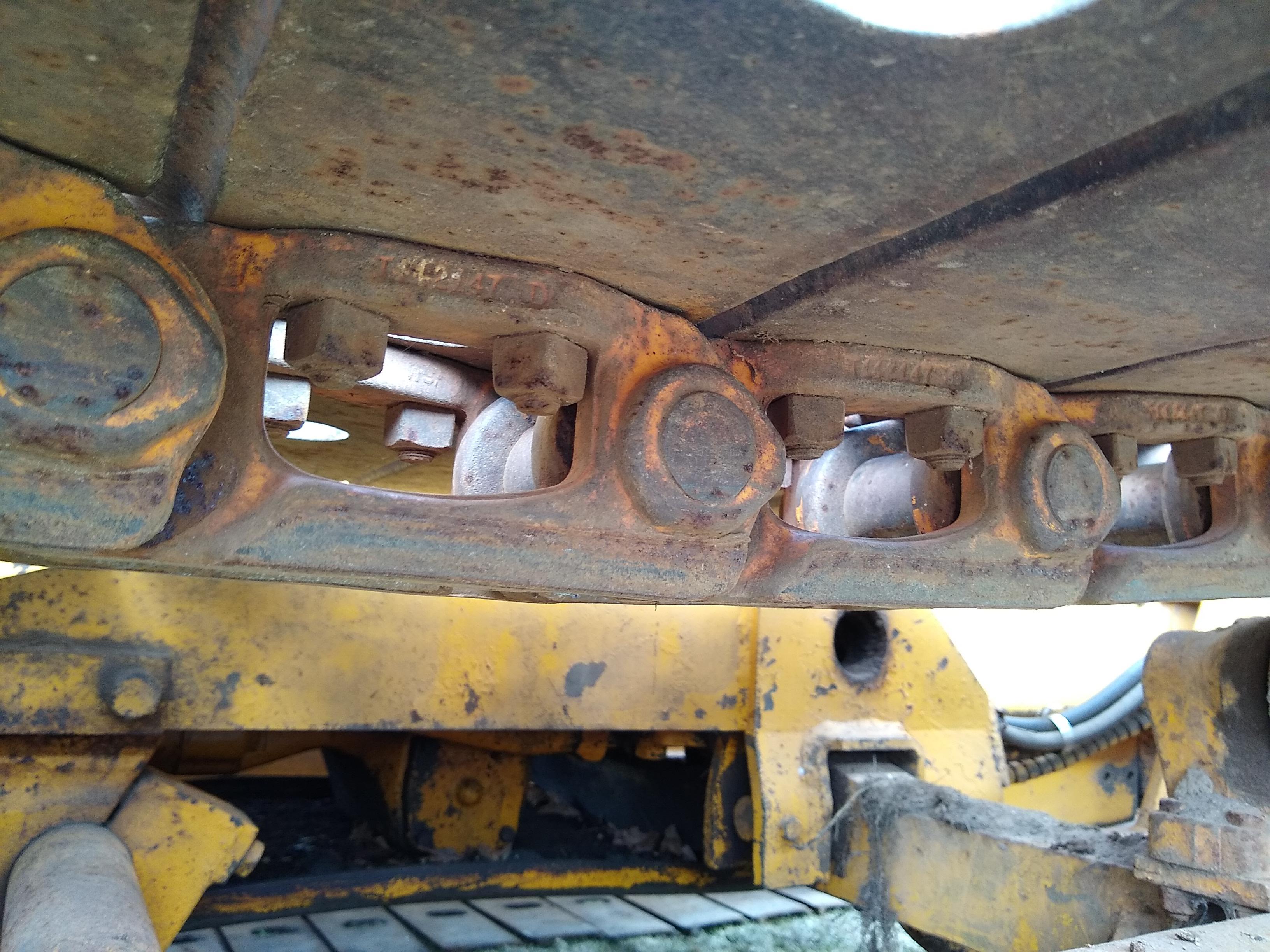 Watch the video. John Deere JD 350-B wide track dozer with 9 foot 6-way blade. Tracks are 32" wide.