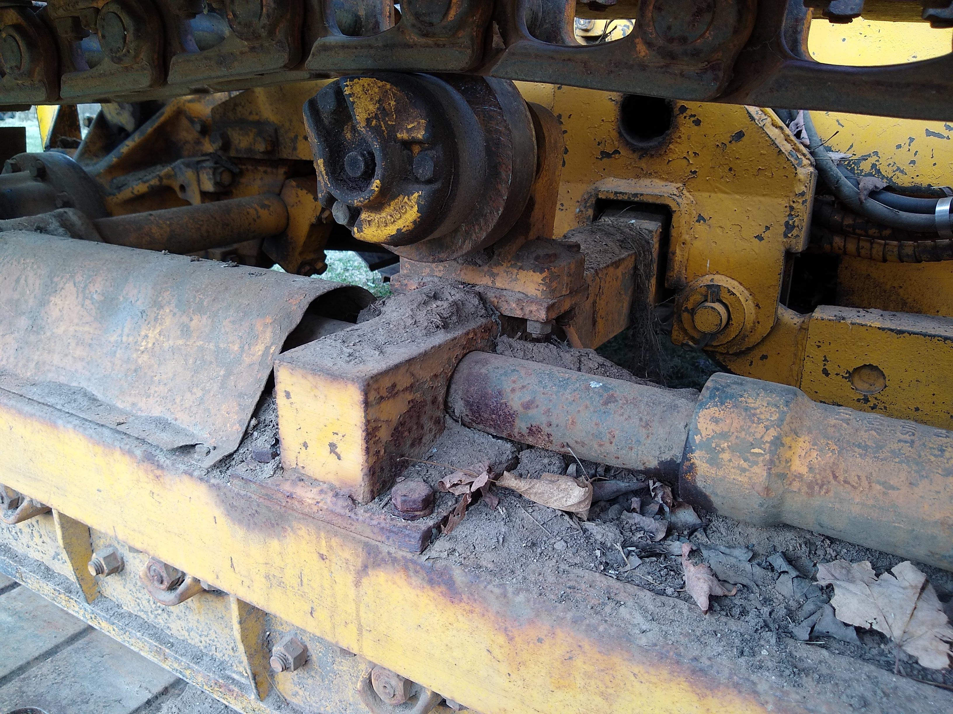 Watch the video. John Deere JD 350-B wide track dozer with 9 foot 6-way blade. Tracks are 32" wide.