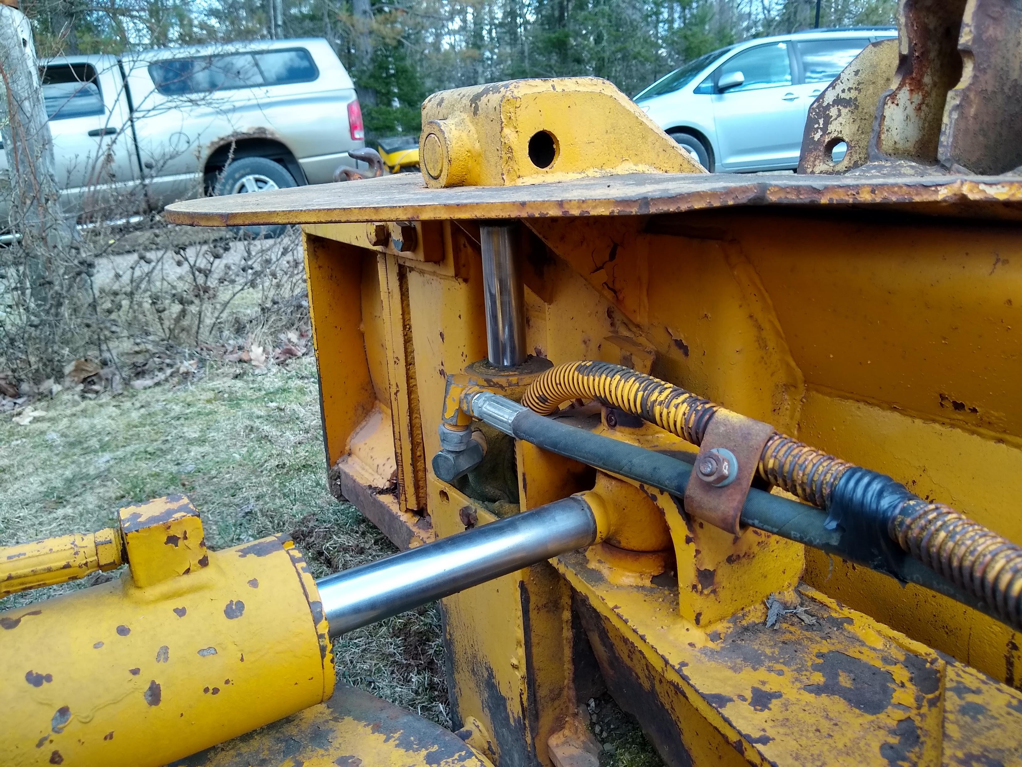 Watch the video. John Deere JD 350-B wide track dozer with 9 foot 6-way blade. Tracks are 32" wide.
