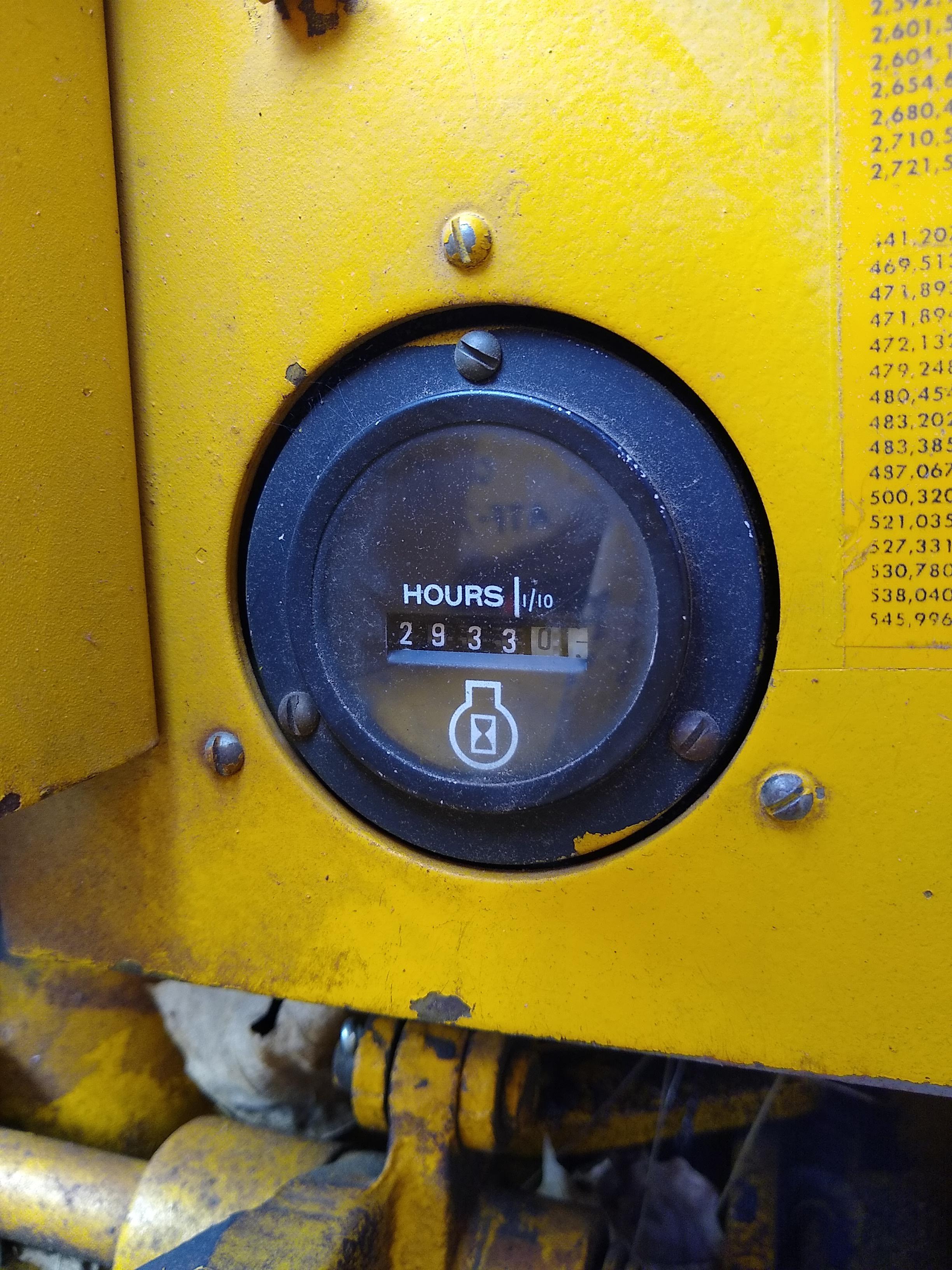 Watch the video. John Deere JD 350-B wide track dozer with 9 foot 6-way blade. Tracks are 32" wide.