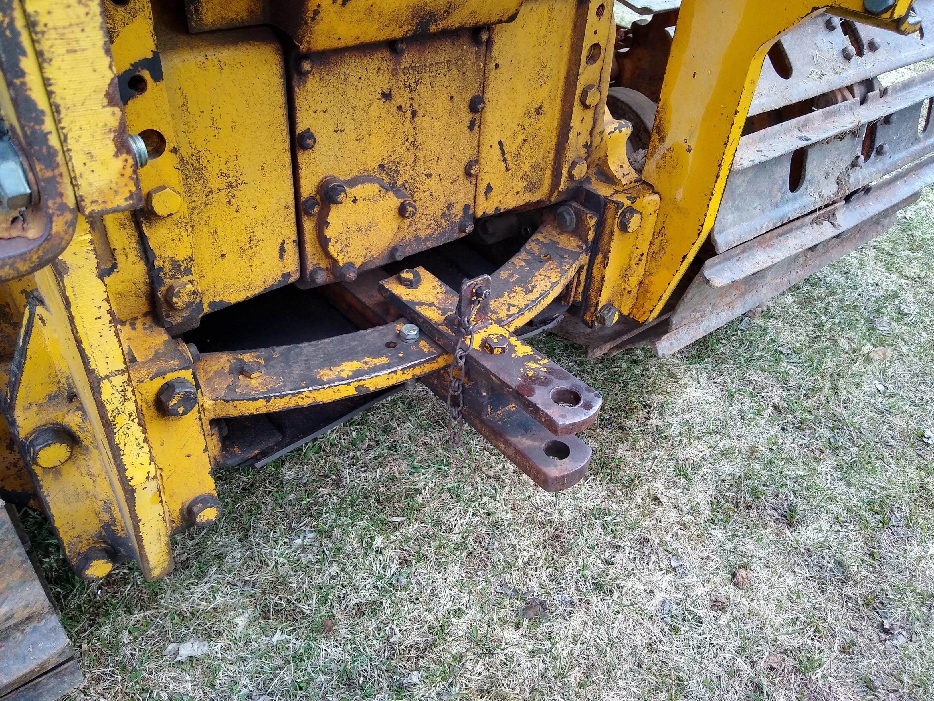 Watch the video. John Deere JD 350-B wide track dozer with 9 foot 6-way blade. Tracks are 32" wide.