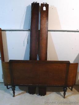 Antique footboard and bed rails, presumably match the converted headboard in the master bedroom.