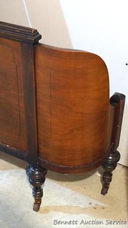 Antique footboard and bed rails, presumably match the converted headboard in the master bedroom.