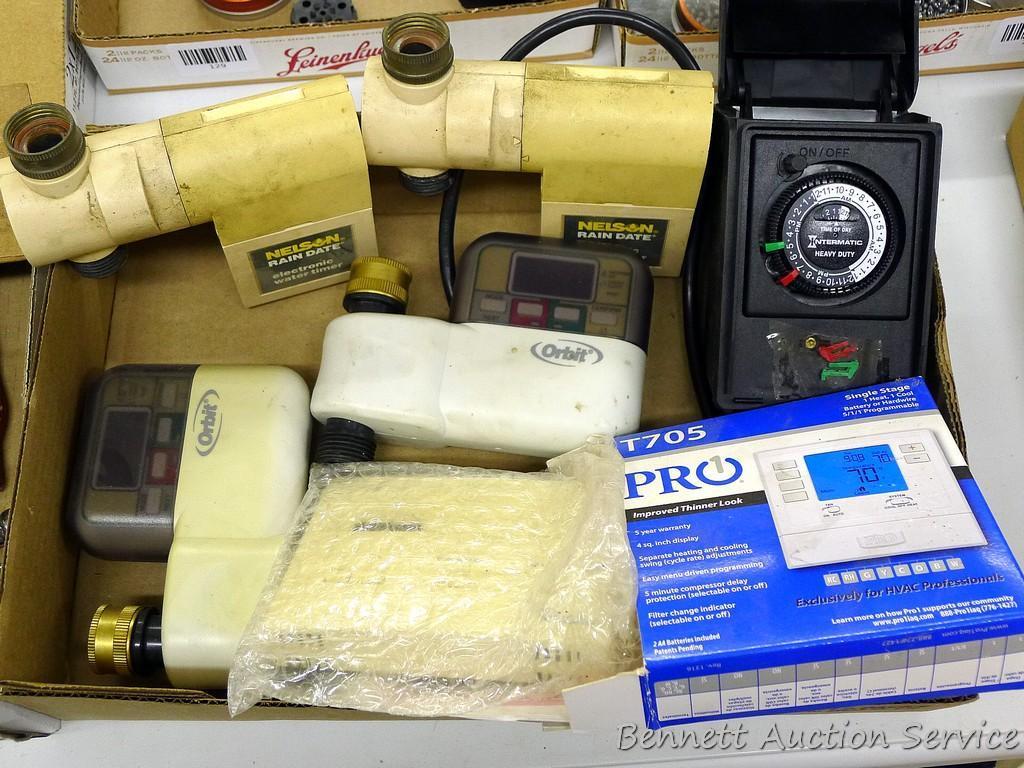 Pro1 single stage programmable thermostat; Intermatic indoor/outdoor timer; two Nelson Rain Date
