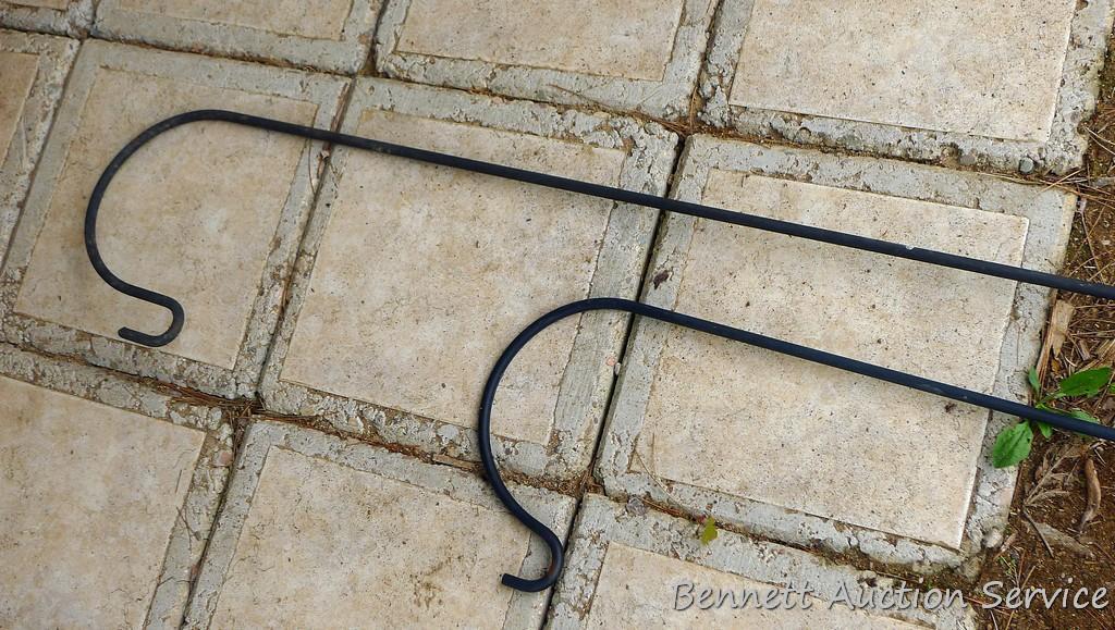 Two shepherd's hooks. Taller is approx. 7-1/2'.
