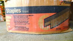 Partial box of Paslode 1/2" x 1-1/2" 16 gauge crown staples; partial box of Paslode 1/2" x 1-3/4" 16