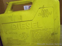 Two 6 gallon diesel totes with nozzles and air intake.