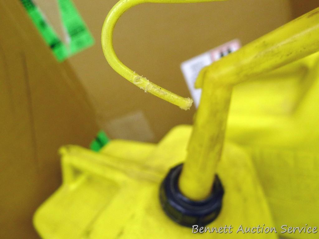 Two 6 gallon diesel totes with nozzles and air intake.