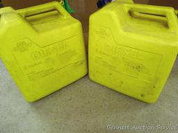 Two 6 gallon diesel totes with nozzles and air intake.