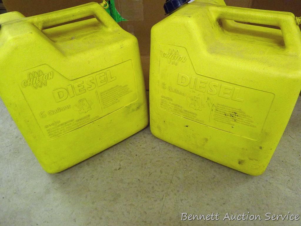 Two 6 gallon diesel totes with nozzles and air intake.