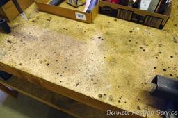 Heavy duty homemade work bench with lower shelf is 4' x 8' x 34-1/2" tall.