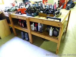 Heavy duty homemade work bench with lower shelf is 4' x 8' x 34-1/2" tall.