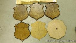 Four backs 10" x 12" for antler mounts and a template; four 3/4" plywood blanks, largest is 11-1/4"