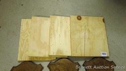 Four backs 10" x 12" for antler mounts and a template; four 3/4" plywood blanks, largest is 11-1/4"