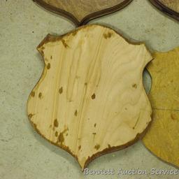 Four backs 10" x 12" for antler mounts and a template; four 3/4" plywood blanks, largest is 11-1/4"
