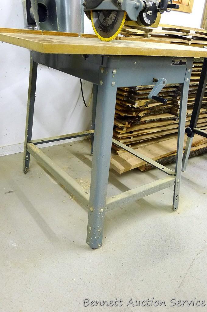 Delta Model 10 Deluxe Radial Arm Saw with Automatic Brake with single phase ball bearing motor. Has
