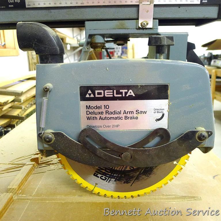 Delta Model 10 Deluxe Radial Arm Saw with Automatic Brake with single phase ball bearing motor. Has