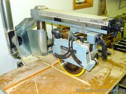 Delta Model 10 Deluxe Radial Arm Saw with Automatic Brake with single phase ball bearing motor. Has
