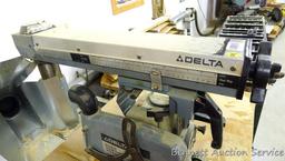 Delta Model 10 Deluxe Radial Arm Saw with Automatic Brake with single phase ball bearing motor. Has