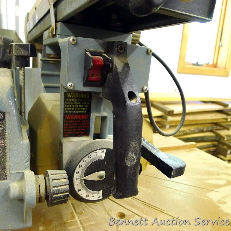 Delta Model 10 Deluxe Radial Arm Saw with Automatic Brake with single phase ball bearing motor. Has