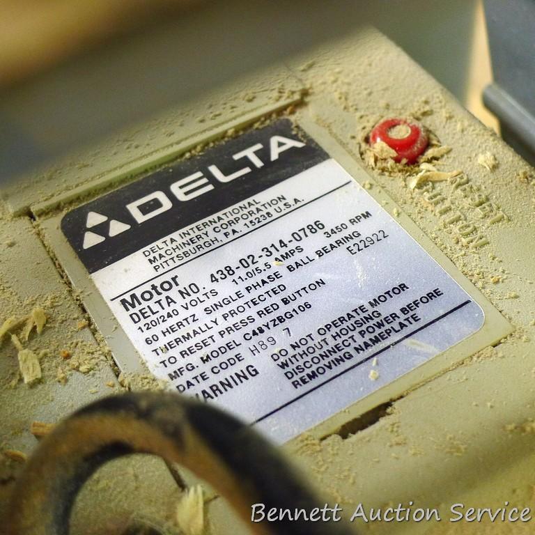 Delta Model 10 Deluxe Radial Arm Saw with Automatic Brake with single phase ball bearing motor. Has