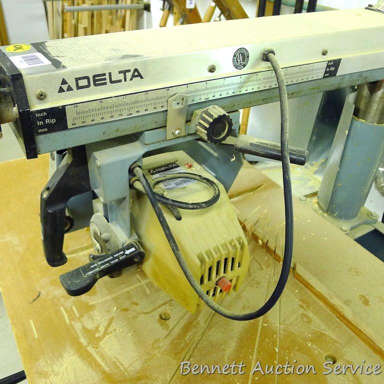 Delta Model 10 Deluxe Radial Arm Saw with Automatic Brake with single phase ball bearing motor. Has