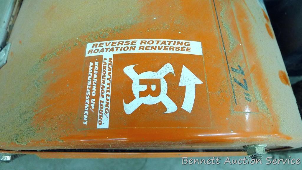 Husqvarna 900 DRT rear tine tiller with dual rotating tines. Comes with owner's manual. Runs.