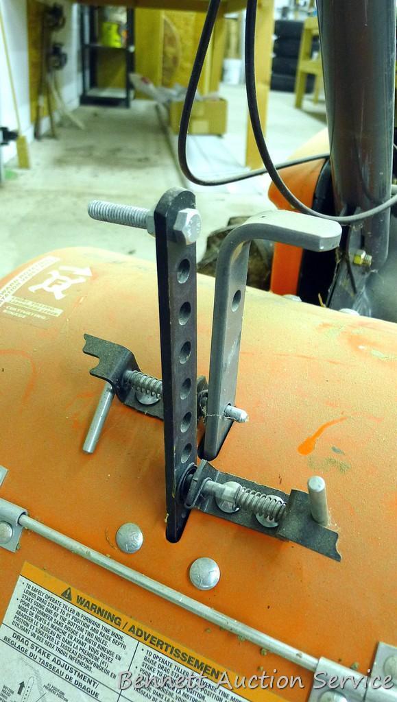 Husqvarna 900 DRT rear tine tiller with dual rotating tines. Comes with owner's manual. Runs.
