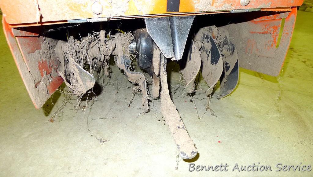 Husqvarna 900 DRT rear tine tiller with dual rotating tines. Comes with owner's manual. Runs.