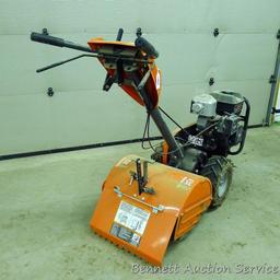 Husqvarna 900 DRT rear tine tiller with dual rotating tines. Comes with owner's manual. Runs.