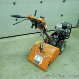 Husqvarna 900 DRT rear tine tiller with dual rotating tines. Comes with owner's manual. Runs.