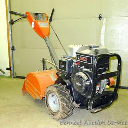 Husqvarna 900 DRT rear tine tiller with dual rotating tines. Comes with owner's manual. Runs.