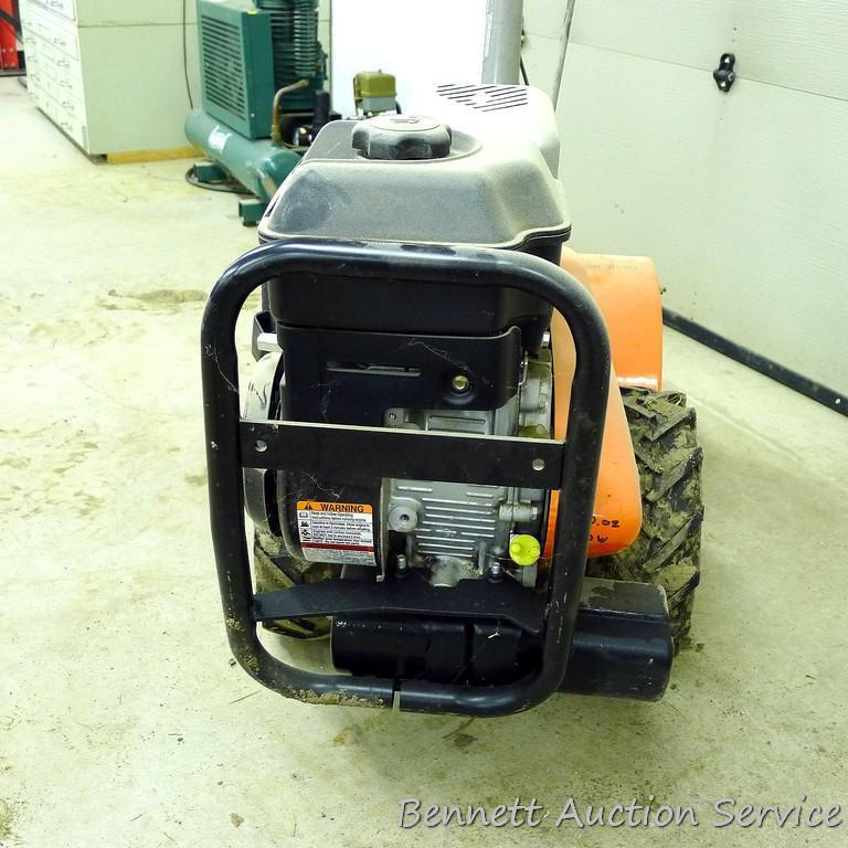 Husqvarna 900 DRT rear tine tiller with dual rotating tines. Comes with owner's manual. Runs.