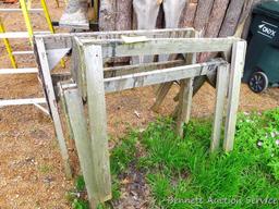 Four saw horses each approx. 32" high x 4' wide.