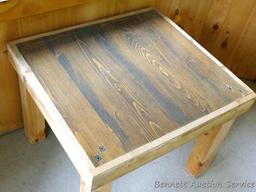 Sturdy wooden table is 25-1/2" x 28" x 22".