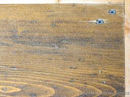 Sturdy wooden table is 25-1/2" x 28" x 22".