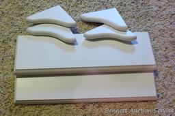 Five white shelves - great accent for just about any room. Longest is 24". All feel sturdy and look
