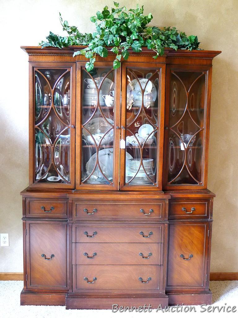 Beautiful antique china hutch is in good condition, glass and trim are intact. Measures 6'8" high x