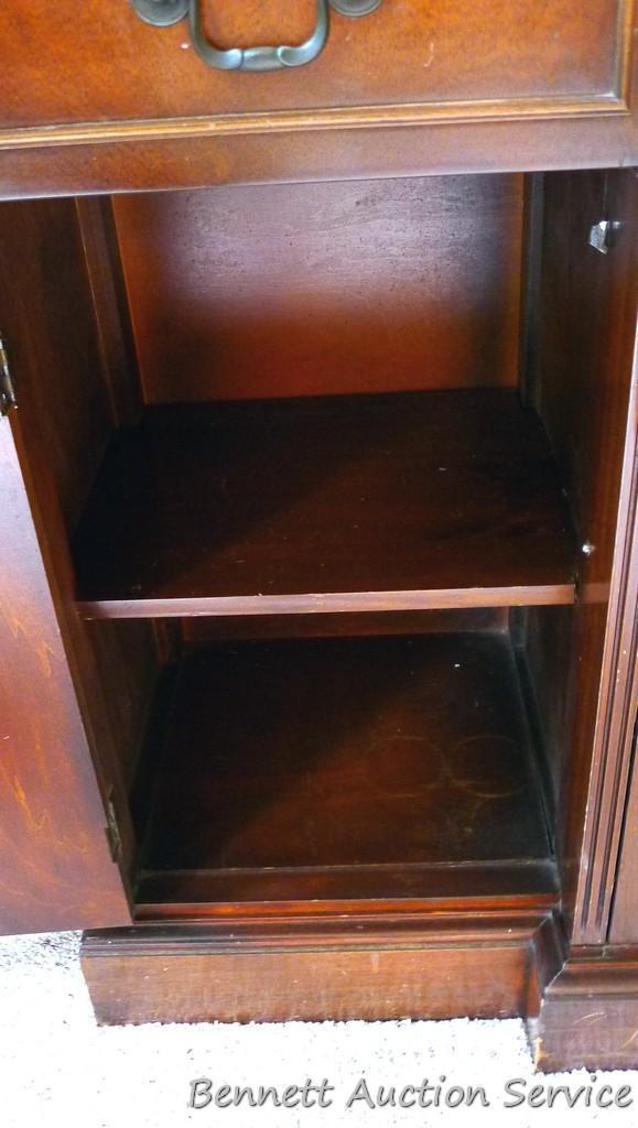 Beautiful antique china hutch is in good condition, glass and trim are intact. Measures 6'8" high x