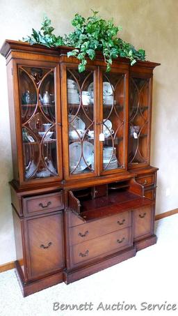 Beautiful antique china hutch is in good condition, glass and trim are intact. Measures 6'8" high x