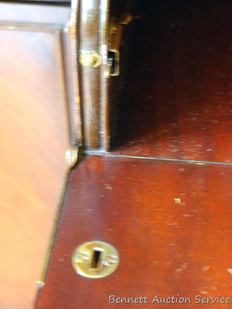Beautiful antique china hutch is in good condition, glass and trim are intact. Measures 6'8" high x