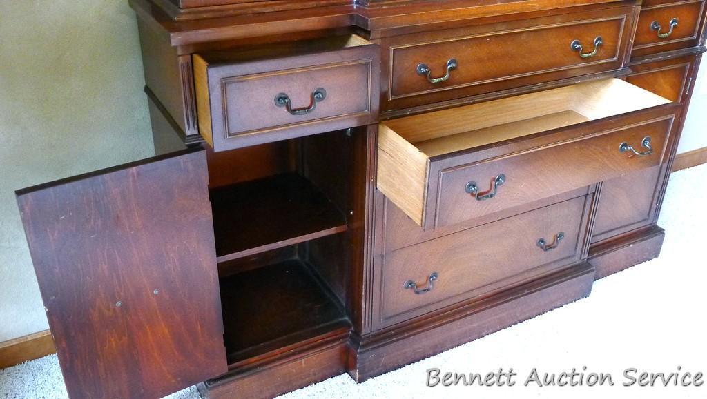 Beautiful antique china hutch is in good condition, glass and trim are intact. Measures 6'8" high x