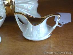 Vintage serving pieces are unmarked and include small creamer, sugar and centerpiece; other