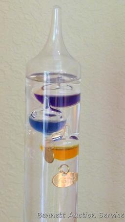 Galileo thermometer is in very good condition. Stands 14-1/2" tall.