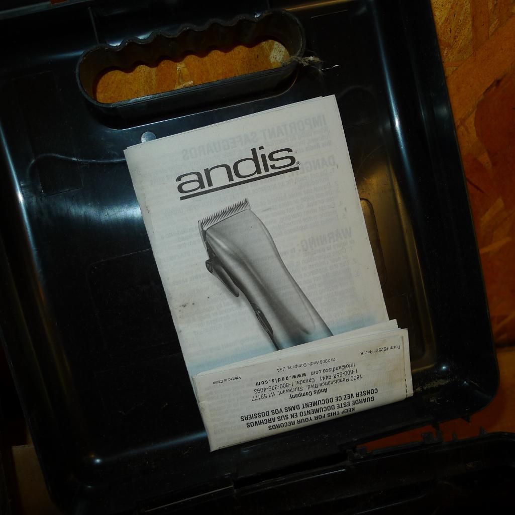 Andis and Wahl pet trimmers or clippers, both run. Wahl trimmer makes a popping sound when started.