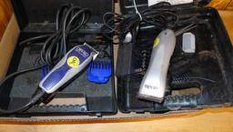 Andis and Wahl pet trimmers or clippers, both run. Wahl trimmer makes a popping sound when started.
