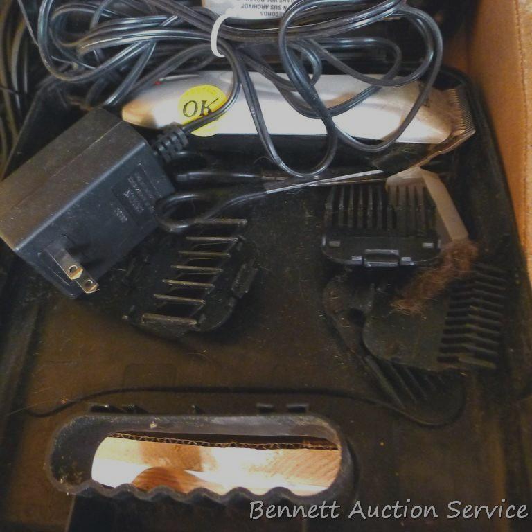 Andis and Wahl pet trimmers or clippers, both run. Wahl trimmer makes a popping sound when started.