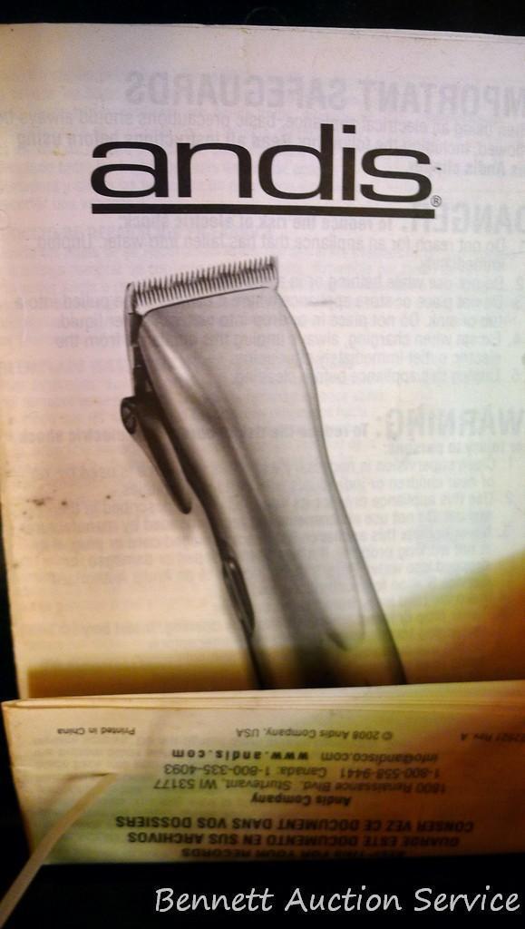Andis and Wahl pet trimmers or clippers, both run. Wahl trimmer makes a popping sound when started.