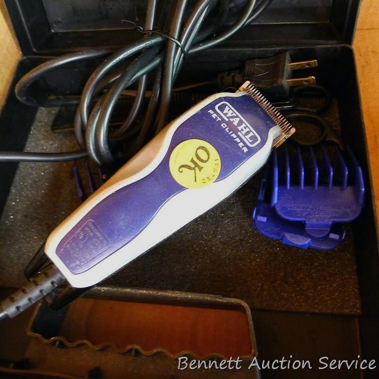 Andis and Wahl pet trimmers or clippers, both run. Wahl trimmer makes a popping sound when started.